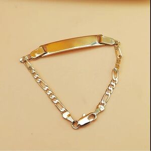 14k gold plated figaro bracelet with high quality lobster clasp
for girls   NWT